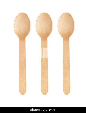 Disposable wooden spoon isolated on white background Stock Photo