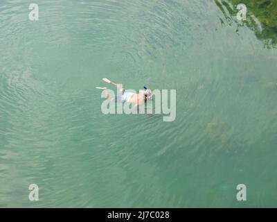 ALANYA, TURKEY - OCT 30, 2021. Spearfisher on the Dimchay river Stock Photo