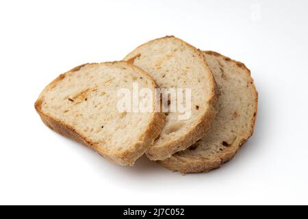 three slices wheat bread isolated on white background, italian fresh bread with tomato, side view Stock Photo