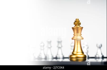 Premium AI Image  A standing golden king chess piece and a fallen silver king  chess piece Symbolizing the victor of a