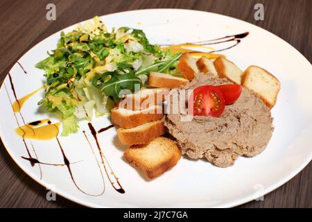 Slice of toasted bread and liver pate Stock Photo