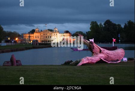 Badminton House and lake illuminated on the eve of the Cross Country Test at the Badminton Horse Trials, UK. 06th May, 2022. Credit: Mark Pain/Alamy Live News Stock Photo