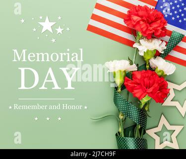 Memorial Day card. American holiday banner with bouquet of carnations, American flag and stars on a green background with inscription Memorial Day Stock Photo