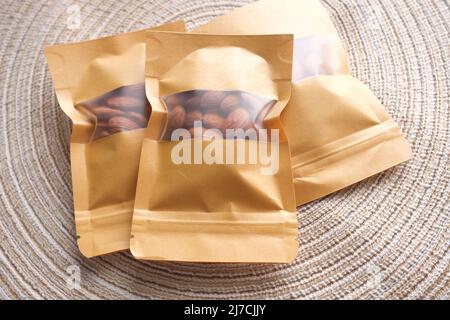 top view of almond nuts in a packet  Stock Photo