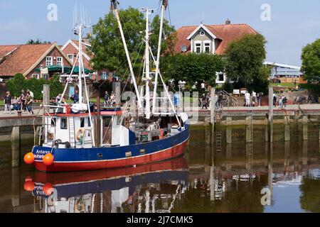 Neuharlingersiel, Germany - August 15, 2021:Traditional fishing vessel Antares (home port Neuharlingersiel) in the small port of Neuharlingersiel. Stock Photo