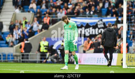 David de Gea of Manchester United looks dejected during  the Premier League match between Brighton and Hove Albion and Manchester United at the American Express Stadium  , Brighton , UK - 7th May 2022 Photo Simon Dack/Telephoto Images.   Editorial use only. No merchandising. For Football images FA and Premier League restrictions apply inc. no internet/mobile usage without FAPL license - for details contact Football Dataco Stock Photo