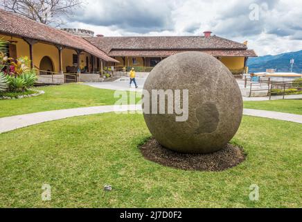 Ancient stone sphere on display at the National Museum of Costa Rica in San José. Stock Photo