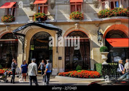 Paris, France-  Luxury Hotel Exterior, 'Hotel Plaza Athenée', Front Façade, Avenue Montaigne, People, concierge, outside, Front Door Stock Photo