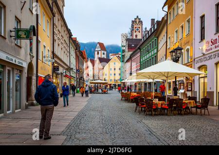 Fussen, Bavaria, Germany - April 28, 2013: Shopping street in the old town of Fussen Stock Photo