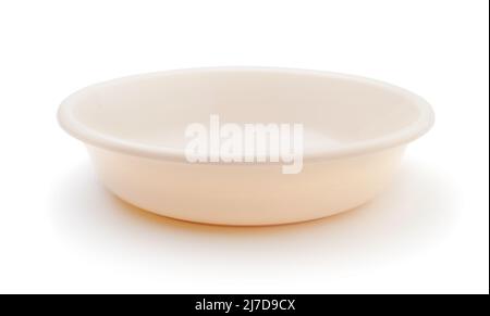 Beige plastic plate isolated on white. Stock Photo