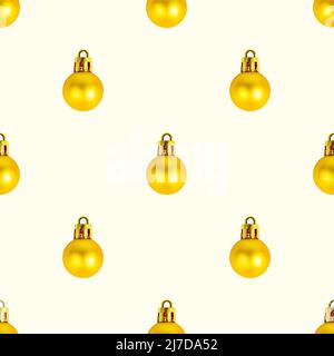 Little golden yellow round Christmas ball repeat seamless pattern on loght background. Stock Photo