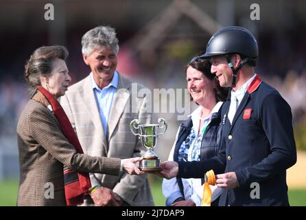 8th May 2022, Badminton Estate, Gloucestershire, England; Mars Equestrian Badminton Horse Trials, day 5;  Oliver Townend receives the third place trophy from HRH Princess Anne Stock Photo