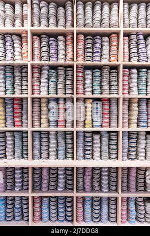 Bayonne in France, colorful espadrilles stored on a shelf Stock Photo