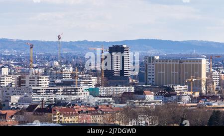View over the skyline of Graz in Austria during Winter on a clear day with blue sky Stock Photo