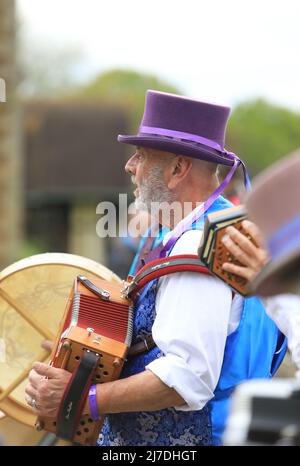 Edenbridge Morris dancers performing at Hever Castle on a miserable May Day weekend, 2022, in Kent, UK Stock Photo