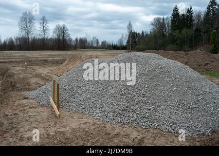 A pile of rubble on a construction site, gray stones Stock Photo