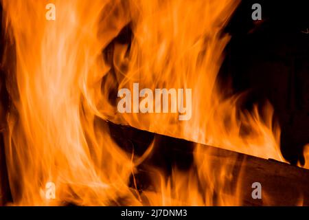 Closeup view on burning wood in a fireplace the home Stock Photo