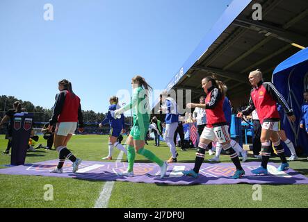Kington Upon Thames, England, 8th May 2022. Chelsea and Manchester United players walk onto the pitch ahead of the The FA Women's Super League match at Kingsmeadow, Kington Upon Thames. Picture credit should read: Paul Terry / Sportimage Stock Photo