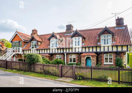 A semi-detached signal box on the end of a row of cottages outside the closed Royal Station at Wolferton on the Sandringham Estate, Norfolk. Stock Photo