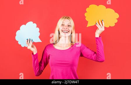 Happy girl with empty speech bubble banner. Woman with two dialog sign. Advertising card. Yes or No. Stock Photo