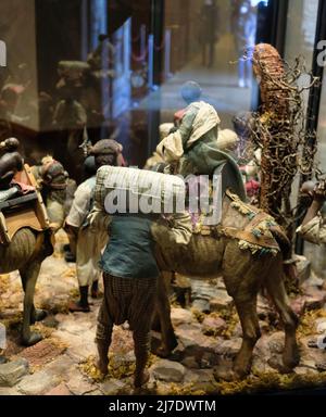 The crib of the Royal Palace of Caserta is a precious Neapolitan crib of the 700, its statuettes are covered with precious fabric and rare stones. Stock Photo