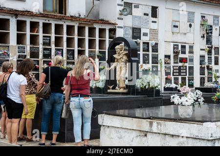 Tourists visiting the tomb of Tancredo Neves, a deceased president of Brazil buried in the cemetery of Sao Francisco de Assis church. Stock Photo