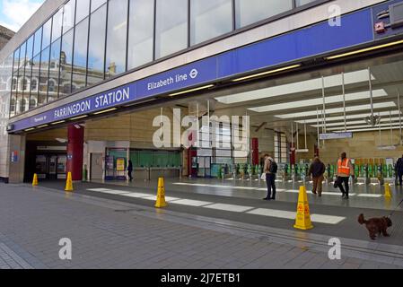 The entrance to Farringdon Station with new signage for the Elizabeth Line, known as Crossrail, ready for opening. Thurs 5th May 2022 Stock Photo