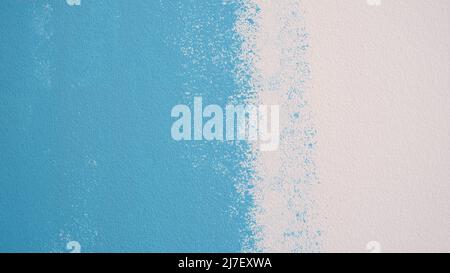 Wall painting white and blue. Wall repair and painting Stock Photo