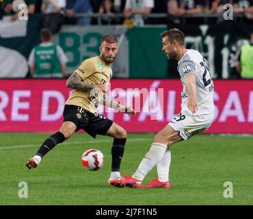 BUDAPEST, HUNGARY - MAY 11: Franck Boli of Ferencvarosi TC celebrates after  scoring a goal with Miha Blazic of Ferencvarosi TC during the Hungarian Cup  Final match between Ferencvarosi TC and Paksi