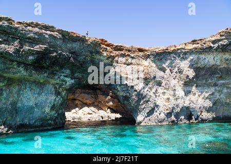 Crystal Lagoon cave seen from a boat next to the island of Comino in Malta. Stock Photo