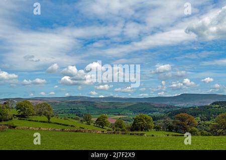 A view across the Usk Valley towards the Black Mountains, part of the Brecon Beacons National Park, on a sunny May day Stock Photo