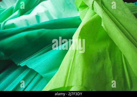 Green textured image of crepe paper in green tones Stock Photo