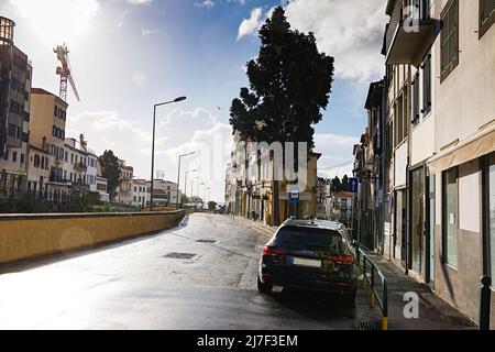 FUNCHAL, MADEIRA ISLAND - February 20, 2022: Funchal city street after the rain Stock Photo