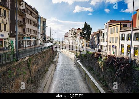 FUNCHAL, MADEIRA ISLAND - February 20, 2022: Funchal city street after the rain Stock Photo