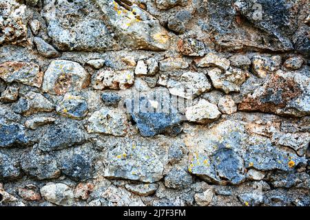 Old  bricks wall pattern. Medieval stone wall.  Background, texture Stock Photo