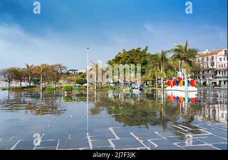 FUNCHAL, MADEIRA ISLAND - February 20, 2022: Urban landscape, embankment. Funchal city street with after rain. Madeira Island Stock Photo