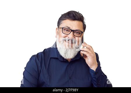 Senior businessman with eyeglasses talking on mobile phone Stock Photo