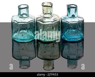 Vintage sheared old ink bottles, antique. Stock Photo