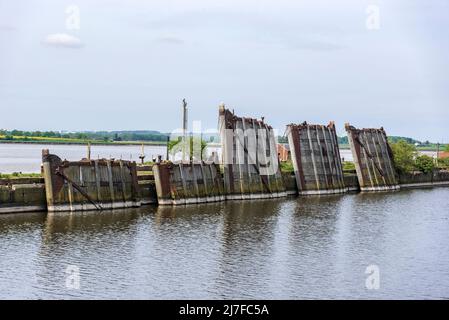Old disused lock gates from the Manchester ship canal. Stock Photo