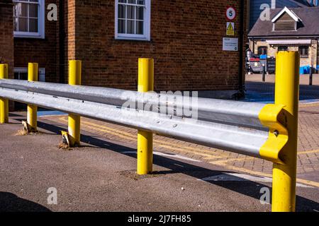 Epsom Surrey, London, May 08 2022, Car Safety Crash Barrier With Yellow Post In A Public Car Park With No People Stock Photo