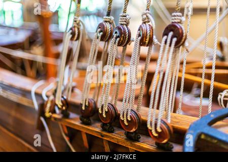 Details of a quality model of an old sailing ship made of wood. Stock Photo