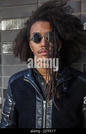 Young man looking at camera Stock Photo