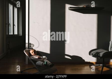 Baby in living room Stock Photo