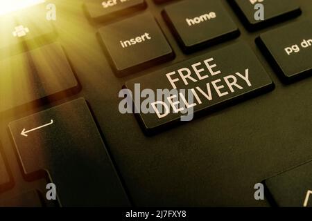 Writing displaying text Free Delivery. Business overview Shipping Package Cargo Courier Distribution Center Fragile Computer Keyboard And Symbol Stock Photo