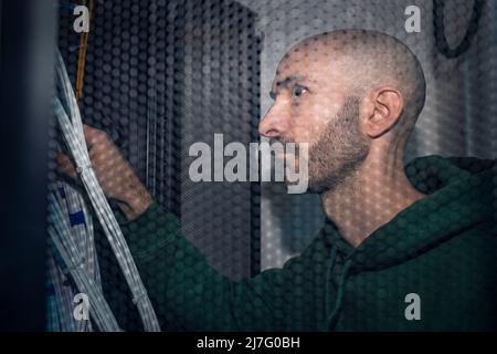 IT technician working in server room Stock Photo