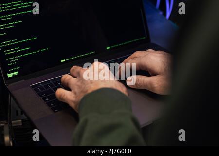 Male programmer working on laptop Stock Photo