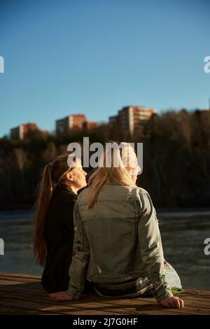 Women relaxing outside Stock Photo