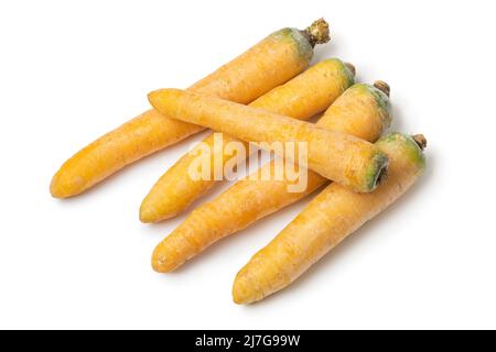 Fresh raw yellow carrots isolated on white background close up Stock Photo