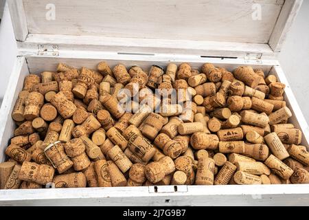 Corks of wine and sparkling wine bottles in a white case. Peschici, Foggia province, Puglia, Italy, Europe Stock Photo