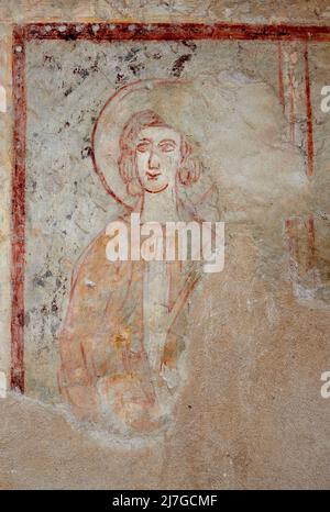 Santo in preghiera  - affresco - pittore lombardo - XIV secolo - Mezzate di Bagnatica (Bg) ,Italia,chiesa di San Pietro Stock Photo